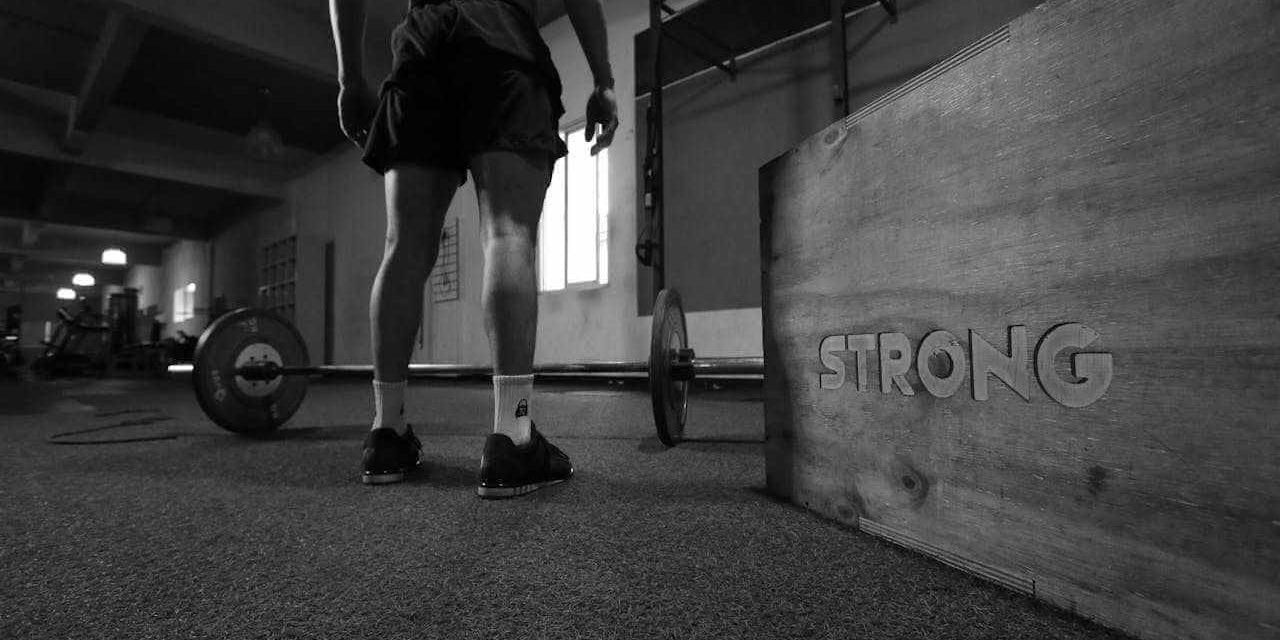 Strength Training for Beginners: Building a Solid Foundation. Photo by Estudio Polaroid