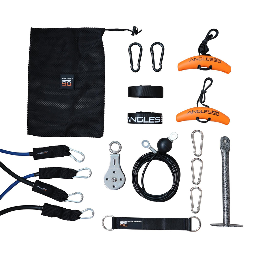 A collection of climbing gear and accessories neatly arranged on a white background, including carabiners, a pulley, a strap, A90 Full Set, a storage bag, and other equipment.